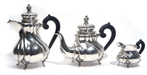 A GERMAN THREE PIECE PART TEA SET (3)