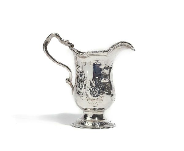 A SILVER CREAM JUG