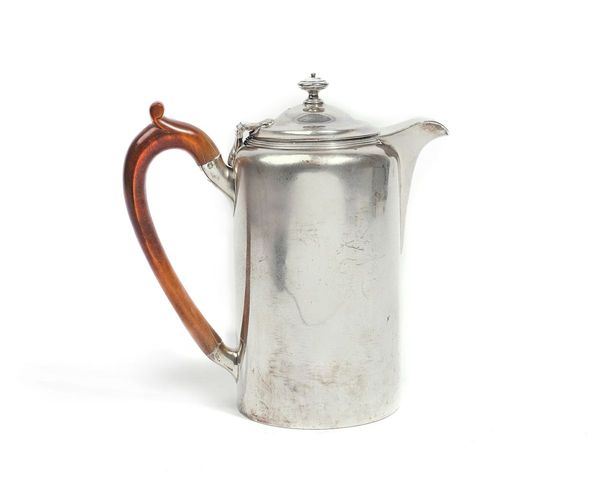 A GEORGE III SILVER HOT WATER JUG