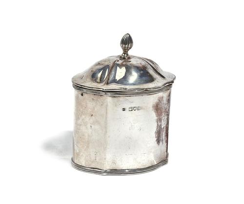 A SILVER TEA CADDY