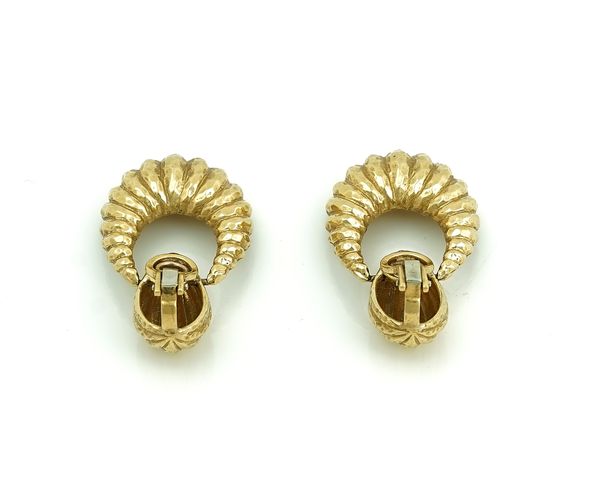 A PAIR OF GOLD EARCLIPS