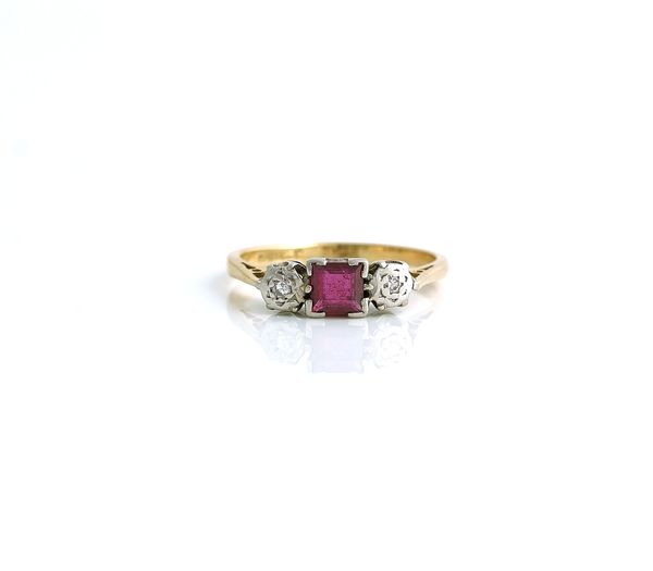 A GOLD AND PLATINUM, RUBY AND DIAMOND SET THREE STONE RING