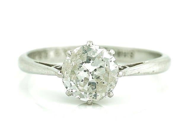 A PLATINUM AND DIAMOND SINGLE STONE RING