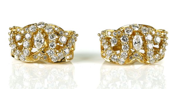 A PAIR OF GOLD AND DIAMOND SET EARCLIPS