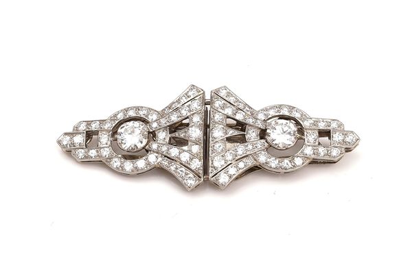 A PLATINUM AND DIAMOND DOUBLE CLIP BROOCH