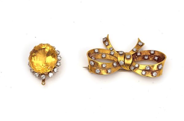 A TOPAZ AND DIAMOND DROP AND A GOLD AND DIAMOND BOW BROOCH (2)