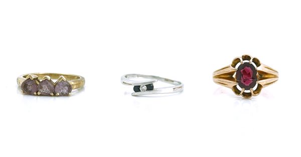 THREE GOLD AND GEM SET RINGS (3)