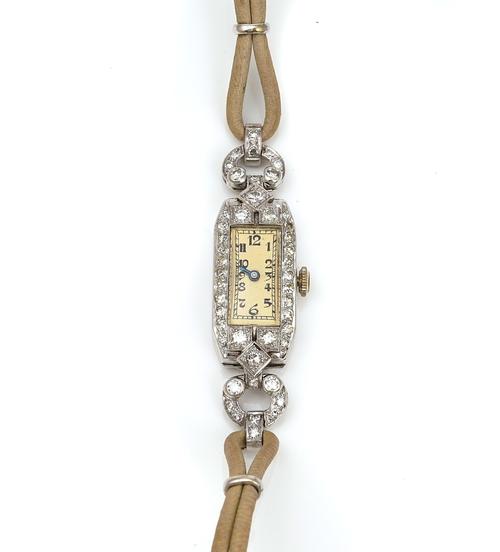 A PLATINUM CASED AND DIAMOND SET LADY'S DRESS WRISTWATCH