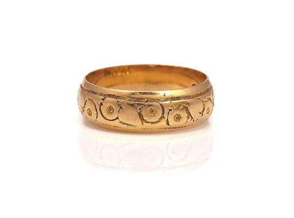 AN 18CT GOLD WEDDING RING