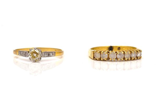 TWO 18CT GOLD AND DIAMOND RINGS (2)