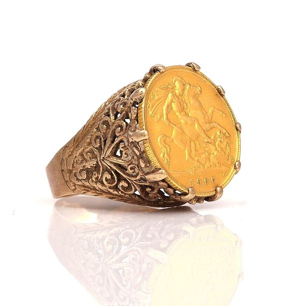 A GOLD MOUNTED HALF SOVEREIGN RING