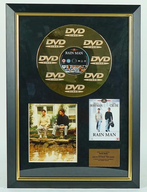 FILM MEMORABILIA: TWO GOLD DISCS AND TWO SIGNED PHOTOGRAPHS (4)