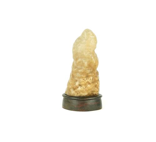 A CALCITE STALACTITE OR STALAGMITE