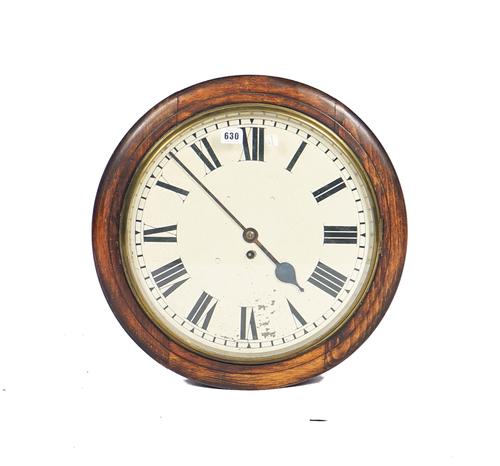AN ENGLISH OAK CASED WALL TIMEPIECE