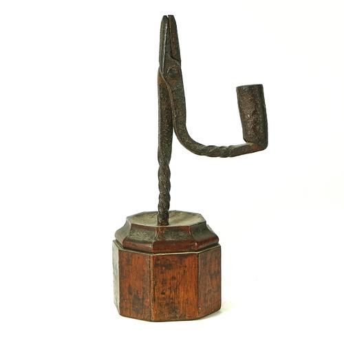 AN ENGLISH WROUGHT IRON RUSH-LIGHT HOLDER
