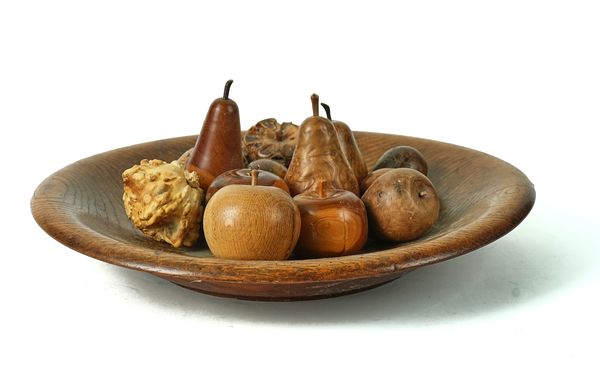 A TURNED ELM BOWL AND VARIOUS TREEN FRUIT