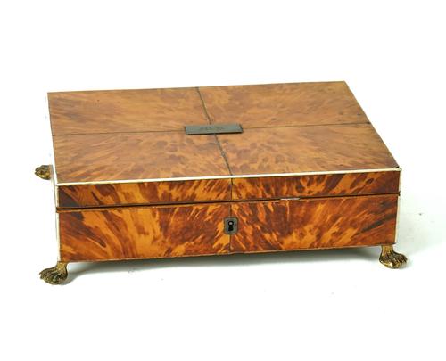 A REGENCY BLONDE TORTOISESHELL VENEERED AND IVORY BANDED SEWING BOX