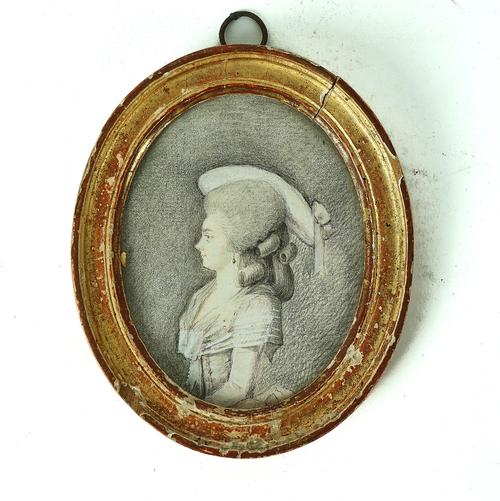 FRENCH SCHOOL: PORTRAIT MINIATURE OF A YOUNG LADY IN PROFILE