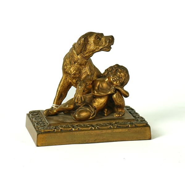 A REGENCY GILT-BRONZE SCULPTURE GROUP OF A SLEEPING CHERUB AND GUARDING DOG