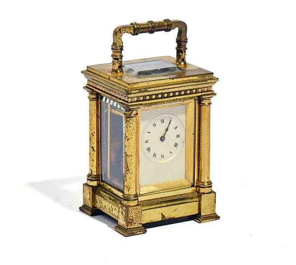 A FRENCH MINIATURE BRASS CARRIAGE TIMEPIECE