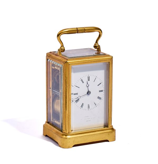 A FRENCH GILT BRASS ONE-PIECE CASE CARRIAGE CLOCK