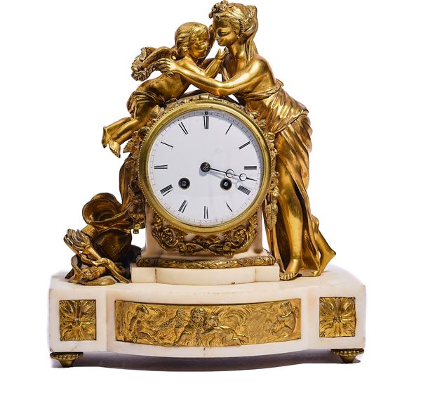 A FRENCH ORMOLU AND MARBLE MANTEL CLOCK