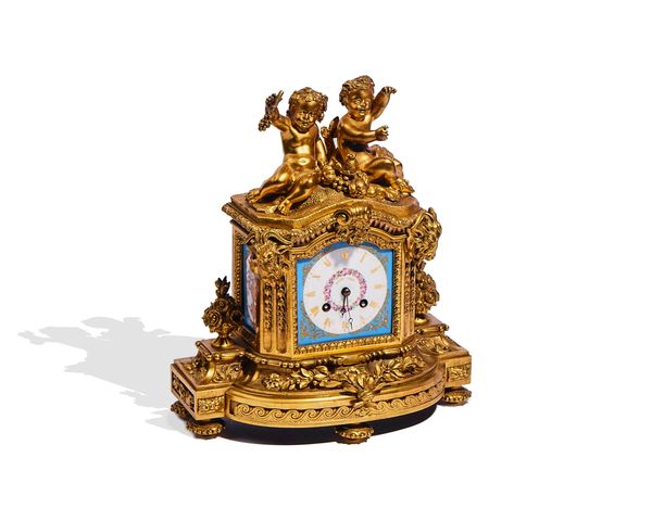 A FRENCH ORMOLU AND SEVRES-STYLE PORCELAIN-MOUNTED MANTEL CLOCK