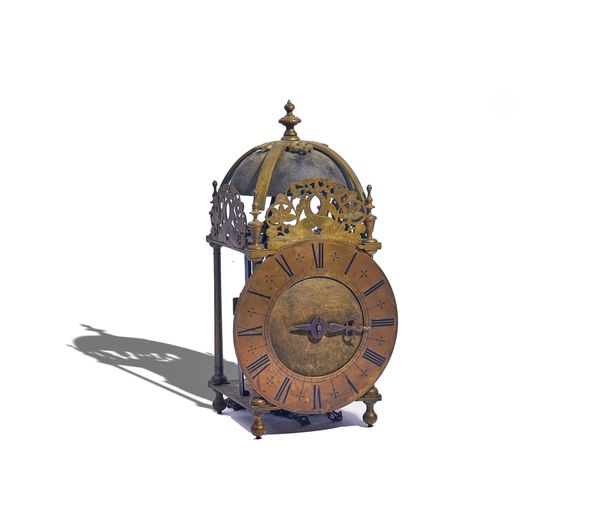 A BRASS LANTERN CLOCK