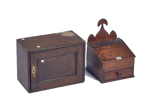 A GEORGE III FRUITWOOD WALL MOUNTED SLOPE FRONT SALT BOX (2)