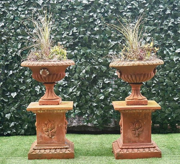 A PAIR OF TERRACOTTA JARDINERES WITH EGG AND DART RIMS (2)