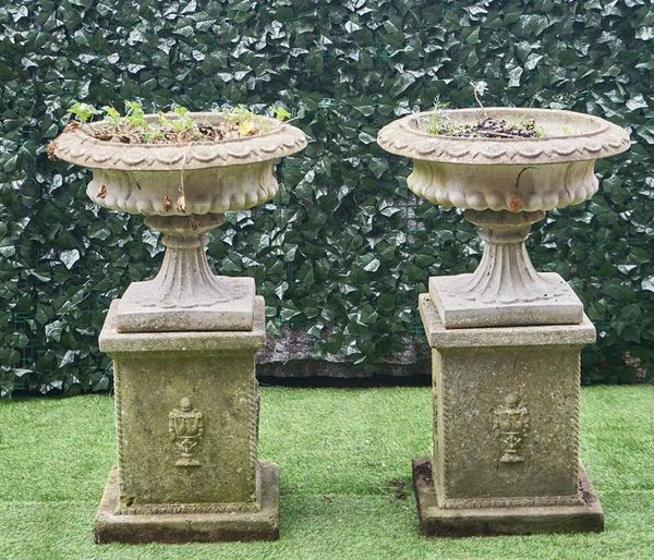 A PAIR OF RECONSTITUTED STONE JARDINIERES  (2)