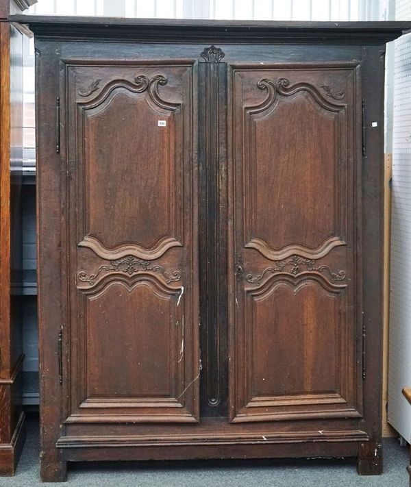 A LATE 18TH CENTURY FRENCH CHESTNUT ARMOIRE