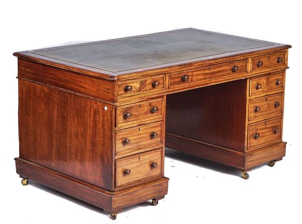 A 19TH CENTURY MAHOGANY PEDESTAL DESK