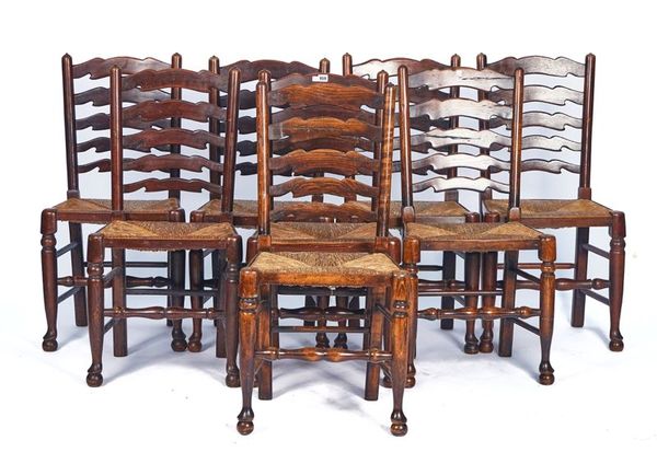 A MATCHED SET OF EIGHT LANCASHIRE LADDER BACK DINING CHAIRS (8)