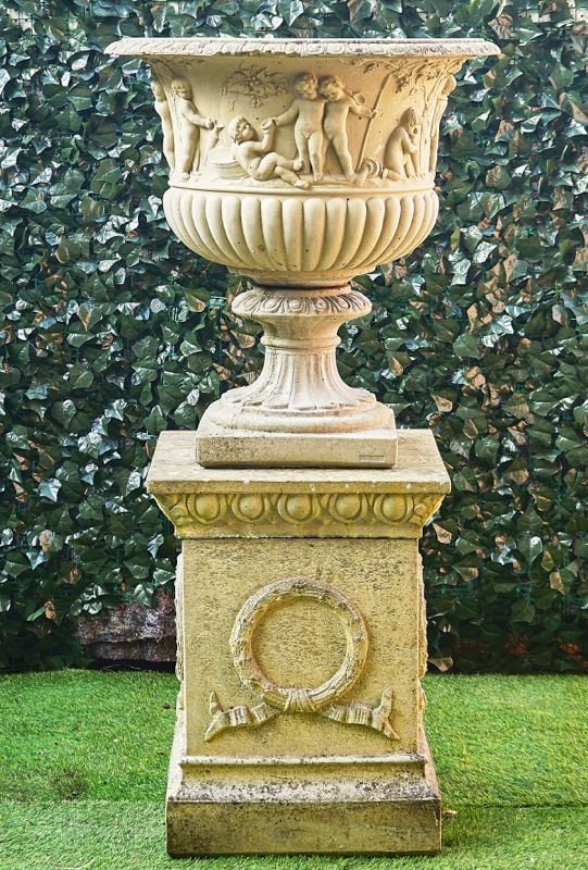 A LARGE RECONSTITUTED STONE JARDINIERE