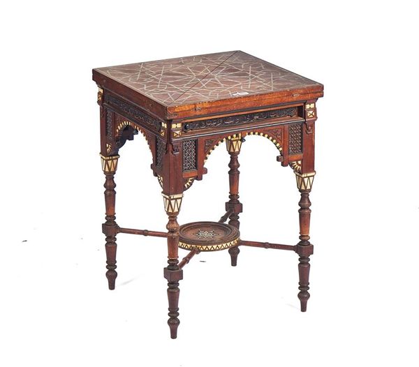 A 19TH CENTURY SYRIAN BONE INLAID HARDWOOD ENVELOPE CARD TABLE