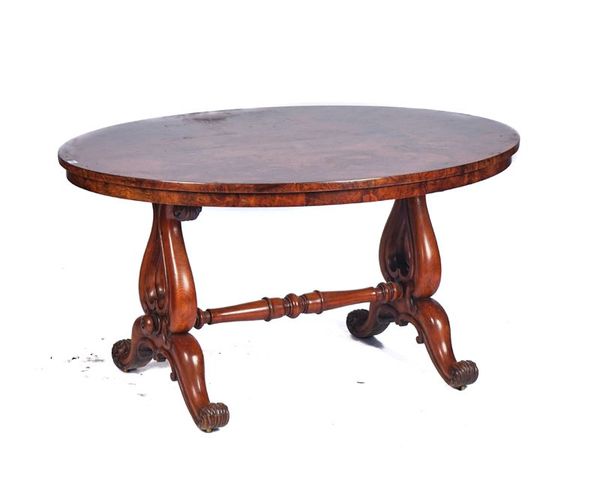 A VICTORIAN FIGURED WALNUT OVAL CENTRE TABLE