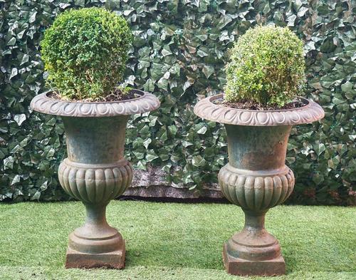 A PAIR OF DARK GREEN PAINTED CAST IRON JARDINIERES (2)