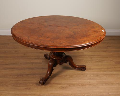 A VICTORIAN FIGURED WALNUT CIRCULAR SNAP TOP CENTRE TABLE