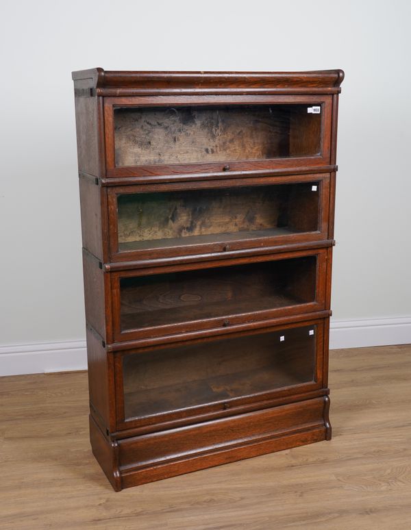 GLOBE WERNICKE; AN OAK FOUR SECTION BOOKCASE