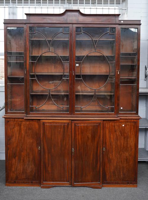 AN 18TH CENTURY MAHOGANY BREAKFRONT BOOKCASE CABINET