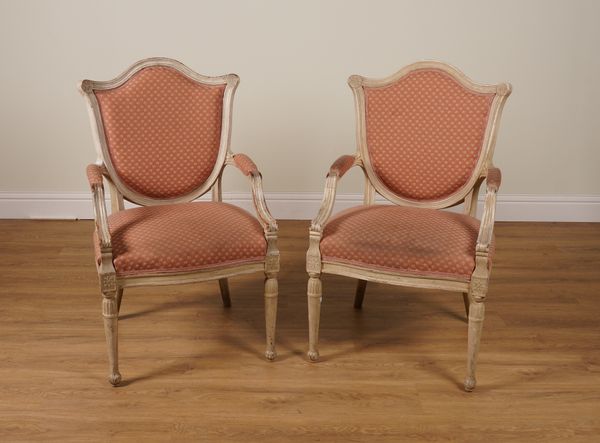 A PAIR OF CREAM PAINTED SWEDISH SHIELD BACK OPEN ARMCHAIRS (2)