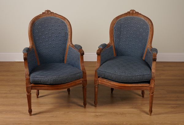 A PAIR OF CARVED BEECH FRAMED LOUIS XVI STYLE TUB BACK ARMCHAIRS  (2)