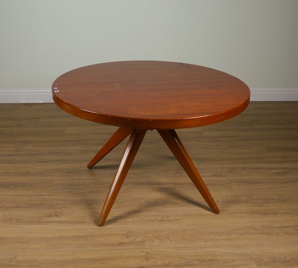 DAVID ROSEN; A TEAK FUTURA CIRCULAR EXTENDING DINNING TABLE