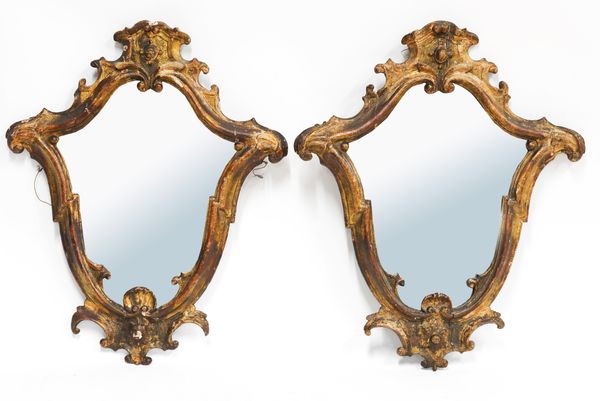 A PAIR OF 19TH CENTURY CARTOUCHE SHAPED GILT FRAMED MIRRORS (2)