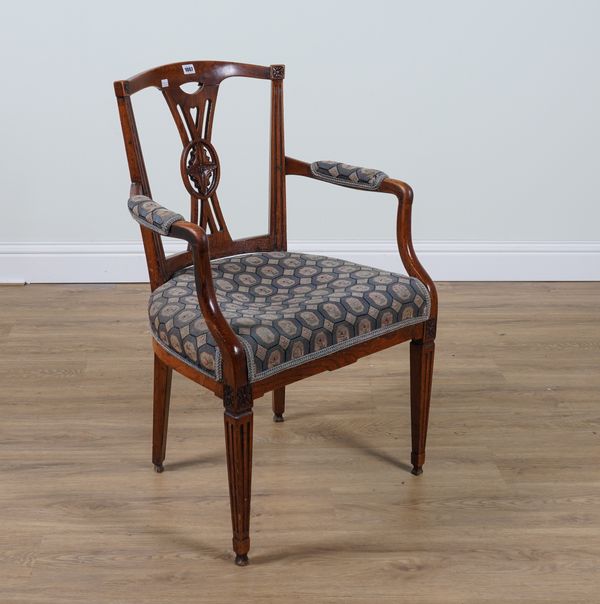 AN 18TH CENTURY OAK OPEN ARMCHAIR