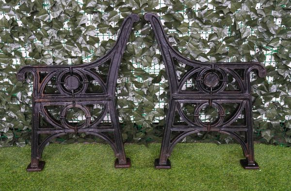 A PAIR OF EARLY 20TH CENTURY CAST-IRON BENCH ENDS