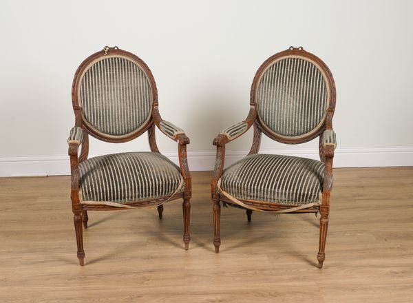 A PAIR OF LOUIS XVI STYLE STAINED BEECH OVAL BACK OPEN ARMCHAIRS (2)