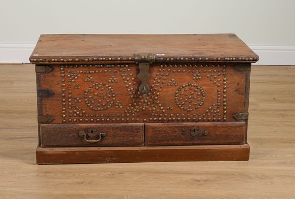 A 19TH CENTURY BRASS STUDDED TEAK TWO DRAWER ZANZIBAR TRUNK