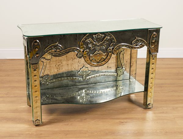 A 20TH CENTURY MIRRORED SERPENTINE CONSOLE TABLE WITH VENETIAN STYLE FRIEZE DECORATION